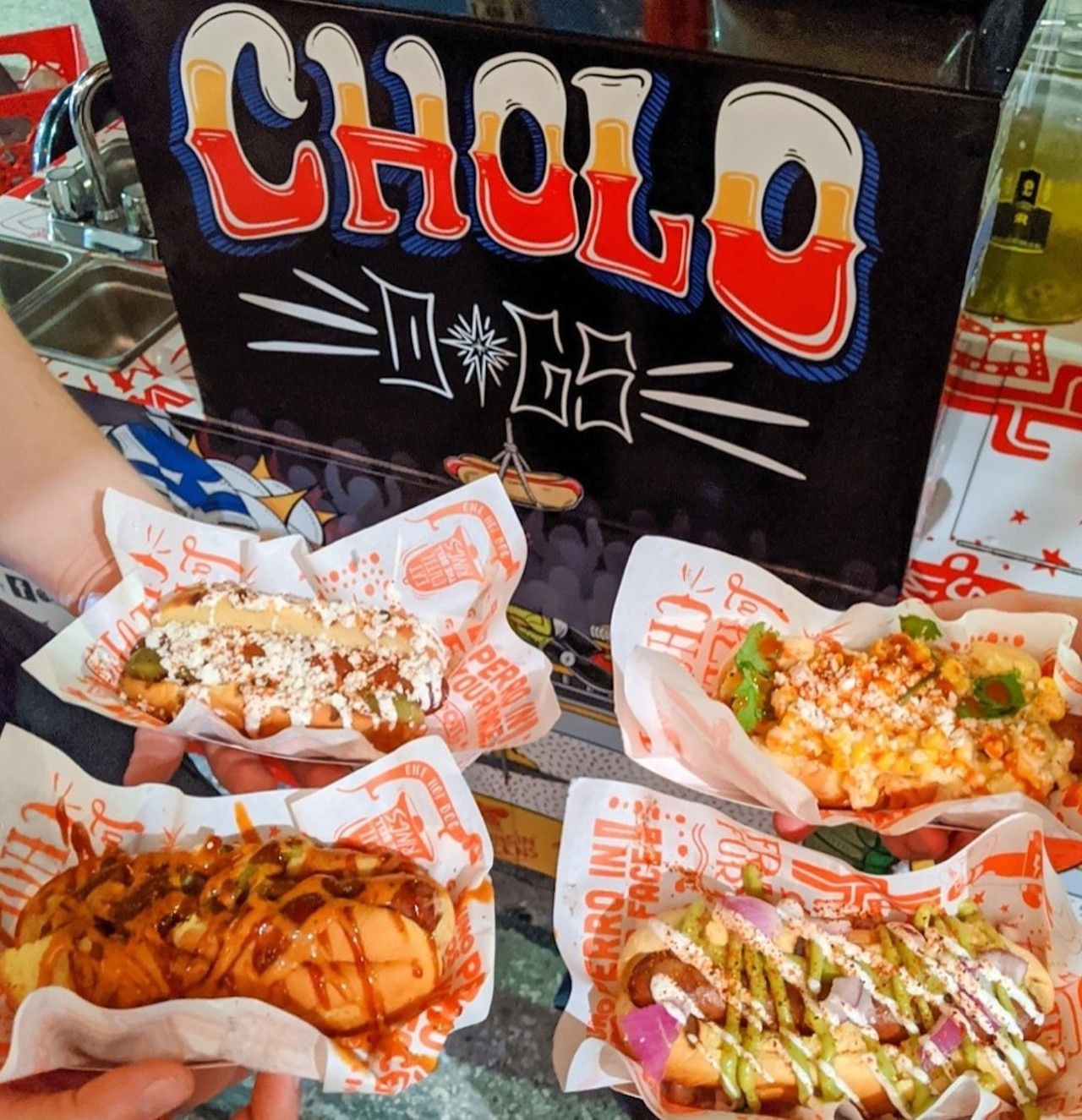 Cholo Dogs 
150 S. Magnolia Ave., 407-412-9230
UPDATE: Cholo Dogs has returned to a pop-up/mobile business model. Follow them on social media to keep track of their location.  Cholo Dogs, started by Franco Furtero, has been all about slingin&#146; tasty Mexican-style weens from their cart to all the hungry people of Mills 50 and beyond. 
Photo via Cholo Dogs/Facebook