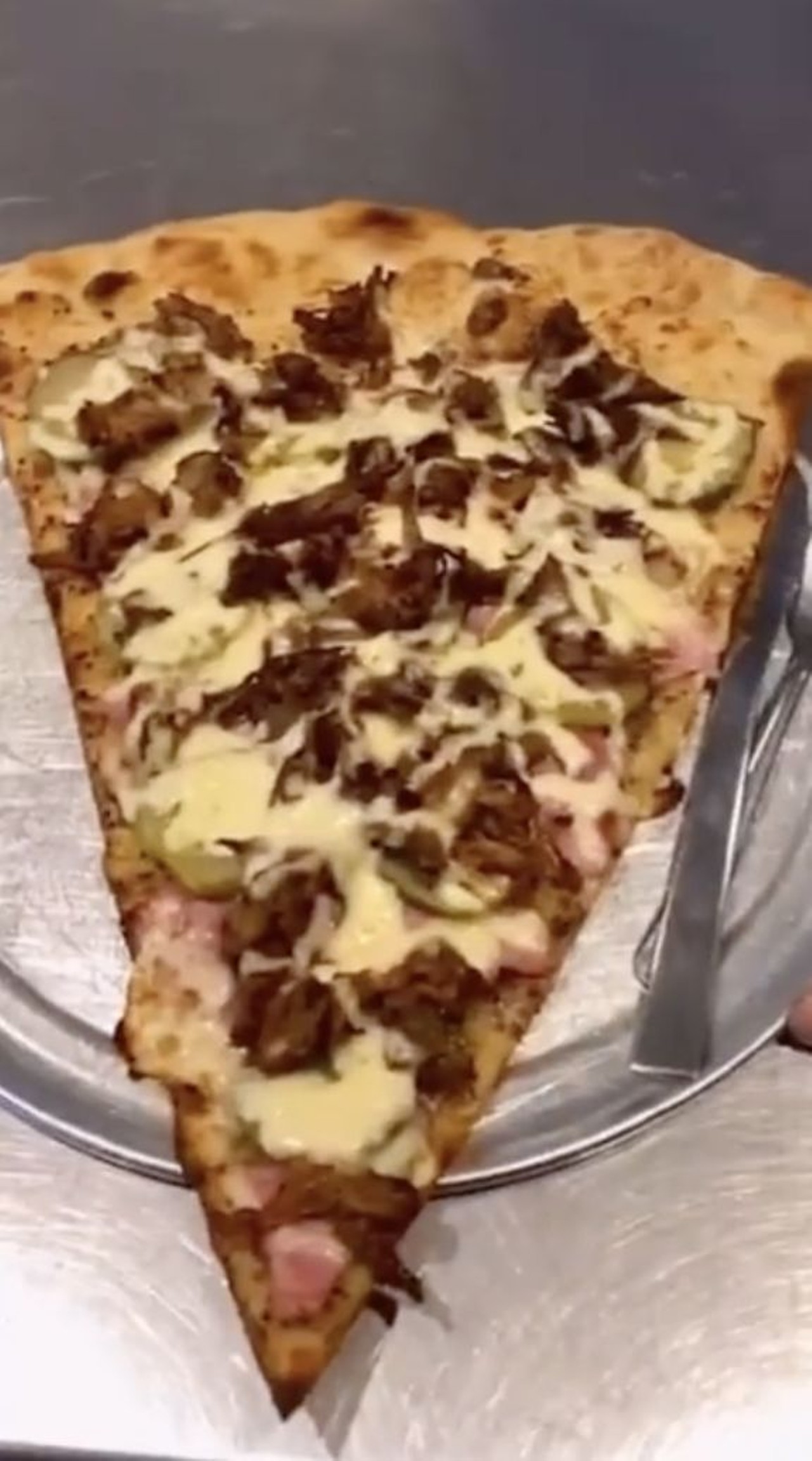  The Cuban Slice 
Lazy Moon, 11551 University Blvd. and 1011 E. Colonial Drive
The Cuban Slice from Lazy Moon is quite the explosion of flavors, featuring a mustard base, mojo pork, ham, and dill pickles.
Photo via Instagram