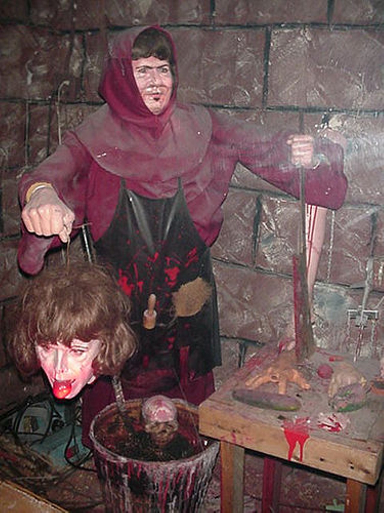 This witch with her decapitated head probably scared a lot of little kids. (image via bigfloridacountry.com)