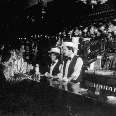 Bartenders take orders at Rosie O'Grady's restaurant, 1974.