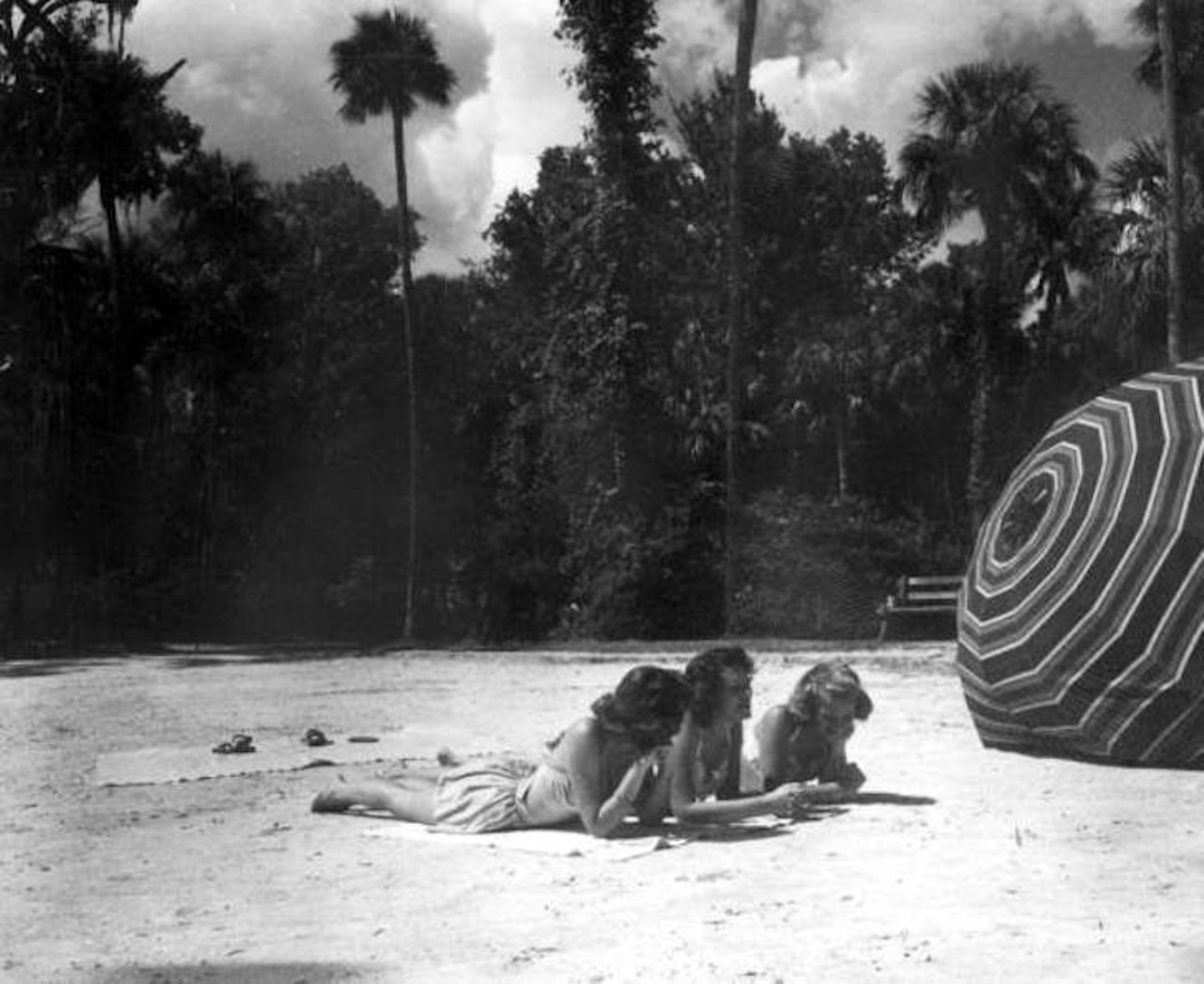 Three girls on the beach at Sanlando Springs, 1946.