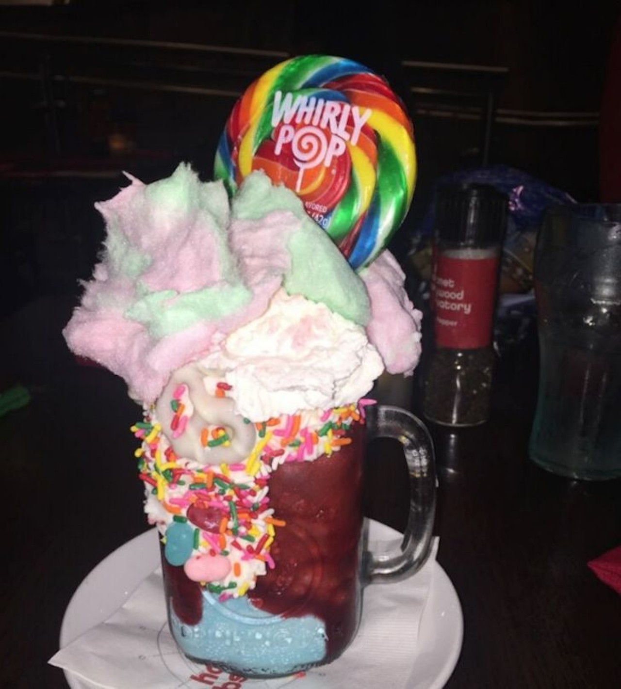 Planet Hollywood: Cosmic Cotton Candy milkshake  
1506 E. Buena Vista Drive, 407-827-7827
Disney Springs has its own slice of Hollywood with food for the stars. Yes, it&#146;s all good, but if you&#146;re looking for extravagance, try the Cosmic Cotton Candy milkshake. This is a cotton candy milkshake with rainbow sprinkles, white chocolate-covered pretzels, actual cotton candy and a giant rainbow lollipop.  
Photo via Yelp/David G.