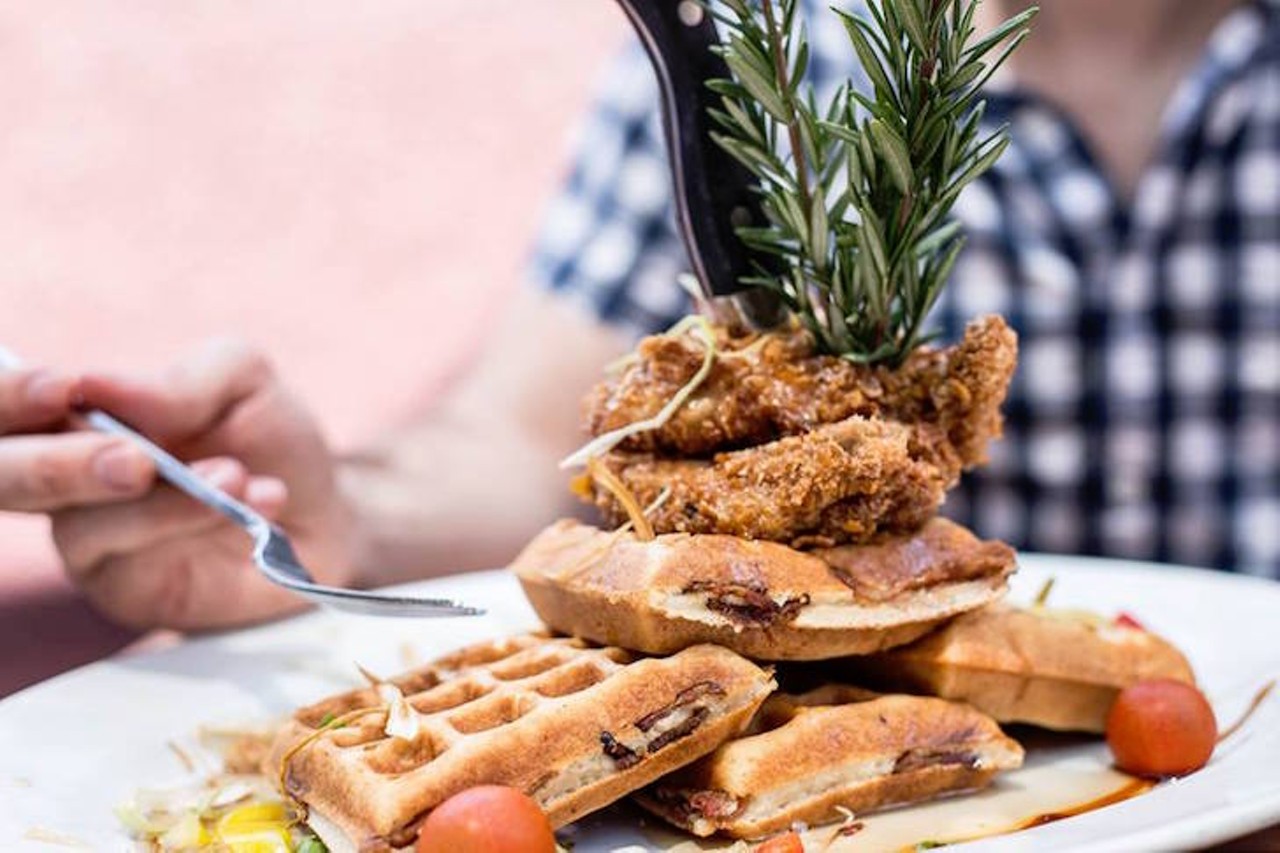 Hash House a Go Go: Sage Fried Chicken  
5350 International Drive, 407-370-4646
A new spin on the classic chicken and waffles. This quarter-chicken is cooked in sage and corn flakes and plonked atop smoked bacon and tomato-topped waffles. 
Photo via Facebook/Hash House a Go Go