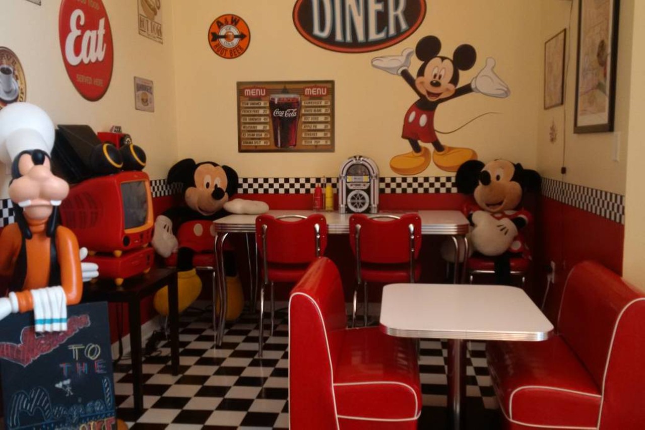 Themed villa only 4 miles to Disney
15 guests, 7 bedrooms, 10 beds, 4.5 baths
$295 per night
Grab some grub and dine with Mickey and Minnie Mouse before heading to the parks to meet the characters in this Mickey's 50s inspired dining area.
