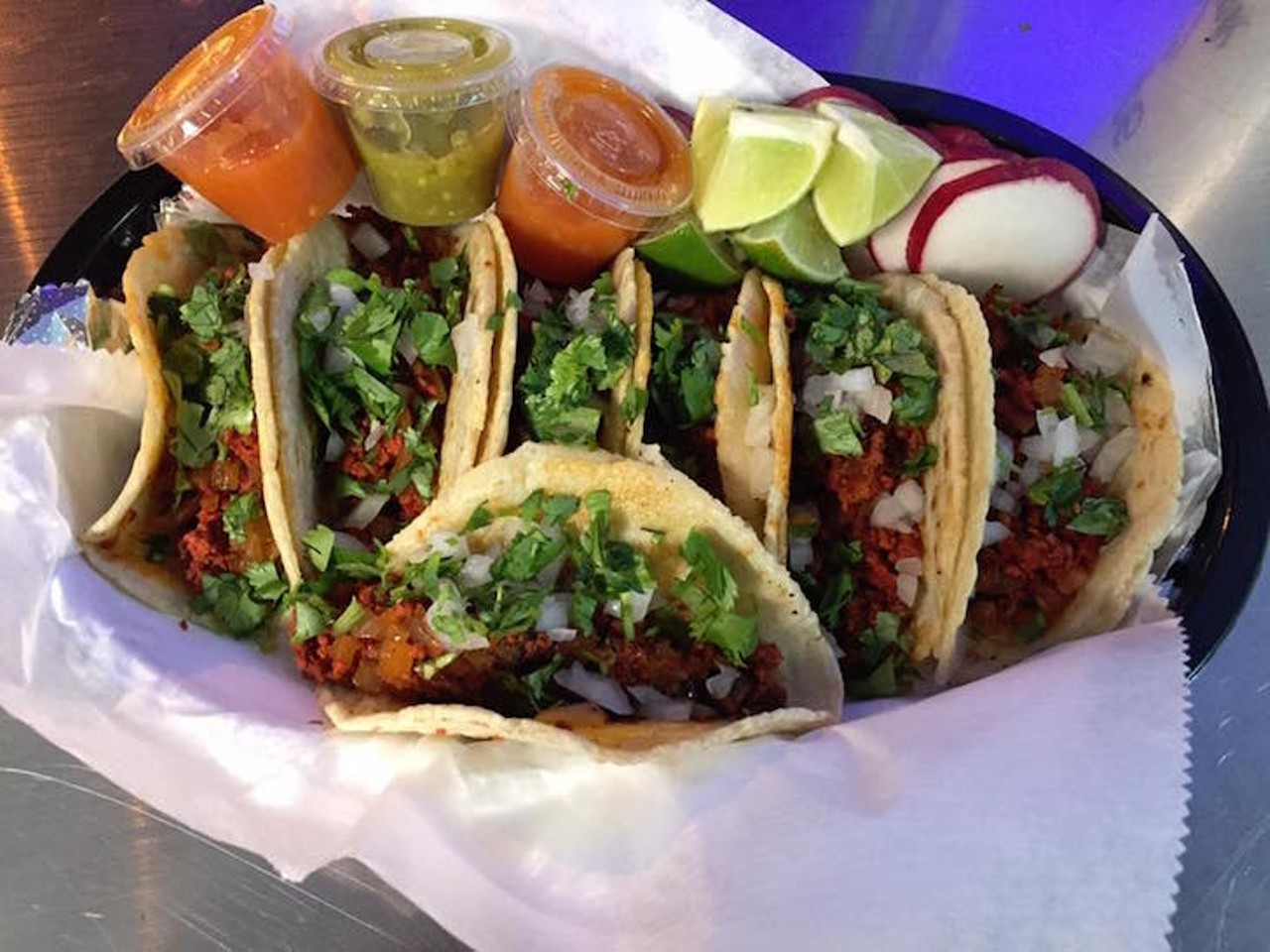 Taquer&iacute;a L.A. Tacos
1404 E. Silver Star Road, Ocoee, 407-715-9496,
"Califas-style" street tacos have never looked better. Taquer&iacute;a L.A. Tacos fills up the gas station parking lot where they stay by serving tacos with carne asada, chorizo, lengua, tripa, buche and our favorite &#150; sweet, red-tinged al pastor pork with onions, cilantro and a tingly lime salsa wrapped up in handmade tortillas.
Photo via Taqueria L.A. Tacos/Facebook