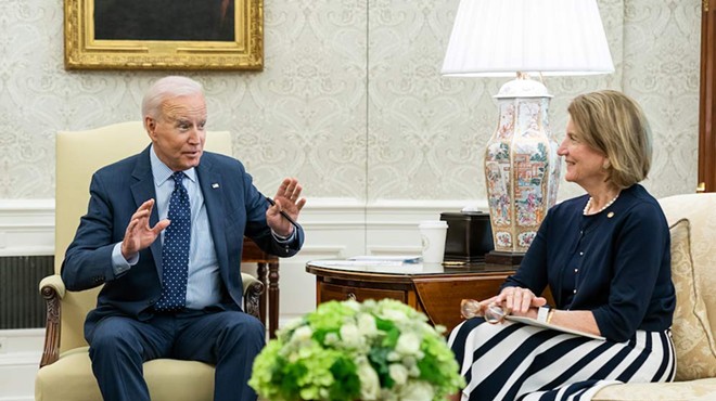President Joe Biden and Sen. Shelley Moore Capito, R-West Virginia, meet in the Oval Office to discuss passing the infrastructure bill