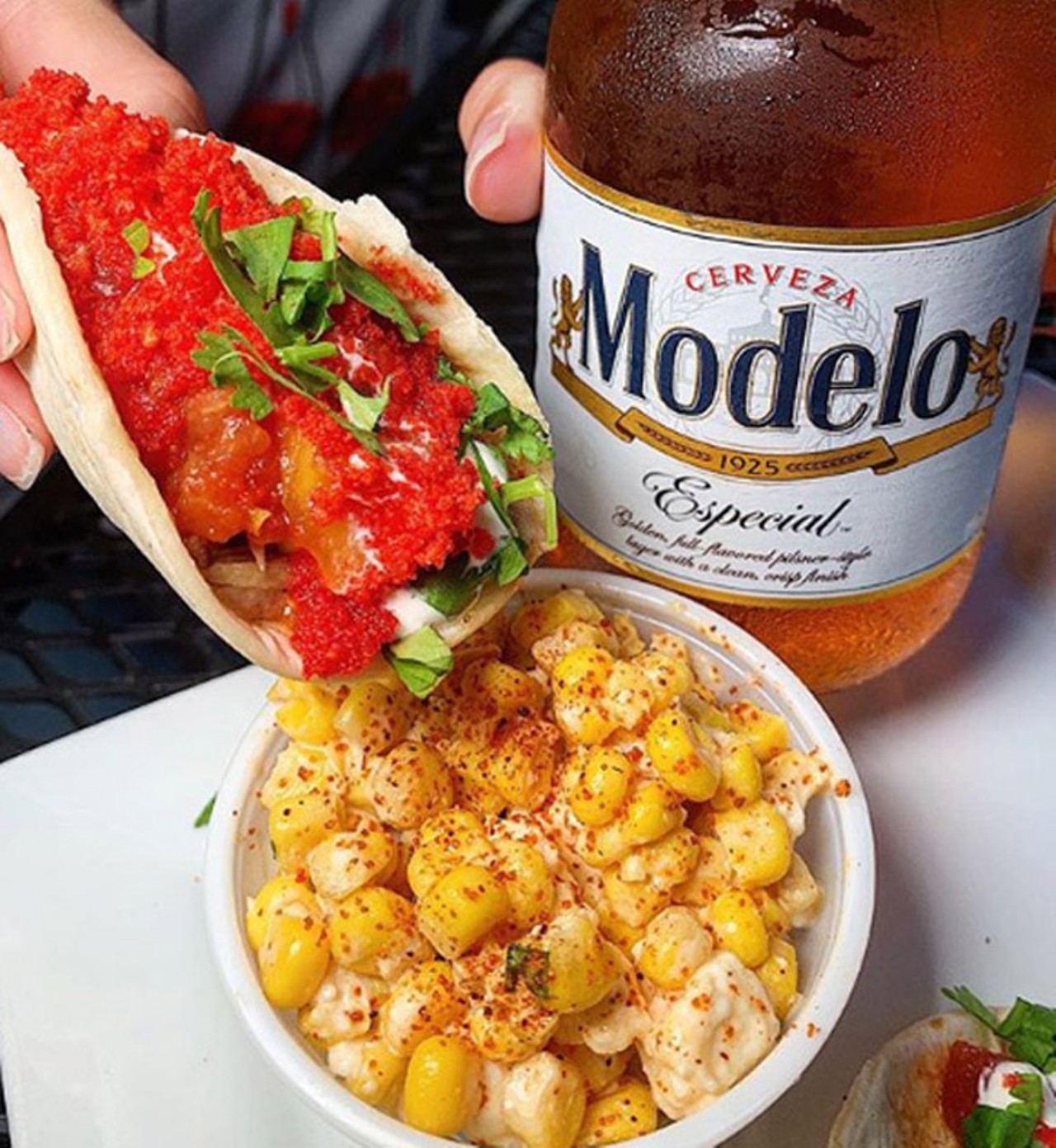 Roque Pub   
3076 Curry Ford Road, 32806, 407-985-3778
Tallboy Taco- Slow Cooked Mojo Pork, served with a mango salsa, topped with cilantro lime sour cream and a Flaming Hot Cheeto dust and fresh cilantro. Best served with a cold Modelo.
Photo via ucfbites/Instagram