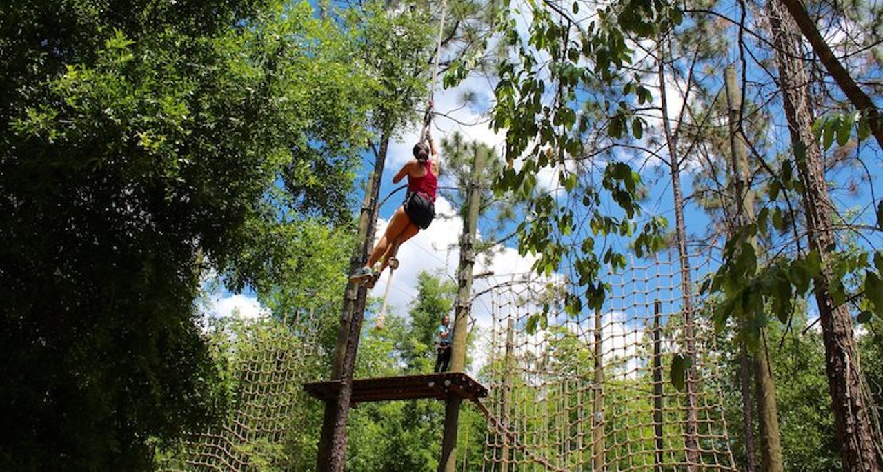 Orlando Tree Trek Adventure Park 
7625 Sinclair Road, Kissimmee, Florida 34747, 407-390-9999
Looking for a thrill while surrounded by a natural pine forest? Orlando Tree Trek Adventure Park offers guests a challenging aerial obstacle course for all skill levels -- five in total, including a kid&#146;s course. Each adventure increases in elevation and difficulty. Some courses include climbing Tarzan Ropes, leaping into hanging nets, soaring through the forest on a zip-line, and so much more. 
Photo via Orlando Tree Trek Adventure Park/Facebook