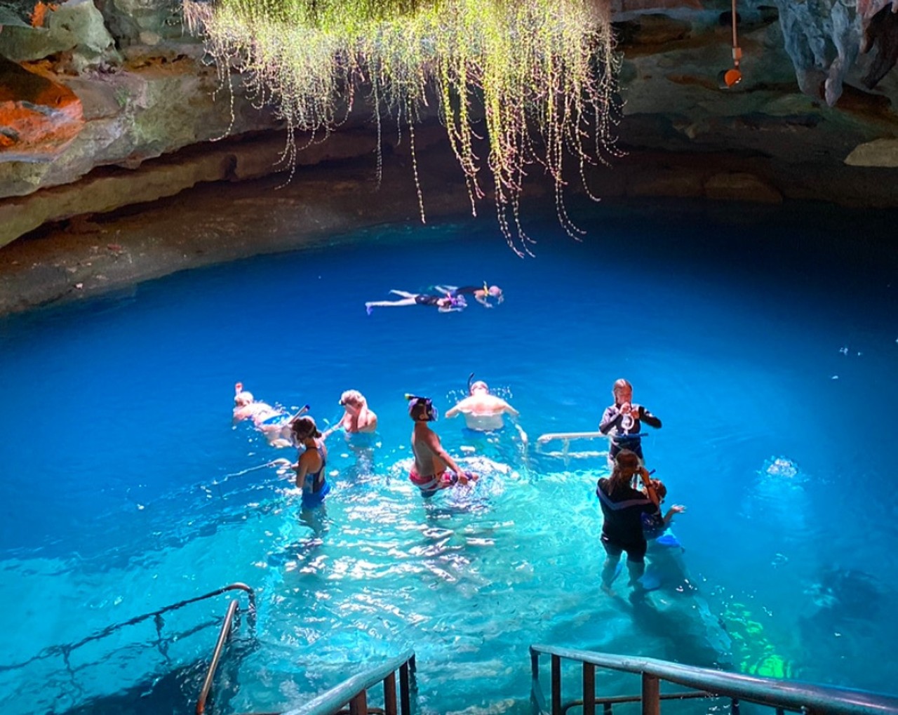 Devil’s Den
2 hours from Orlando
This Instagram-worthy North Central Florida spring gets its name from the steam that was seen radiating from the cave when it was first discovered. Now you can swim, scuba dive or snorkel in this prehistoric water.
