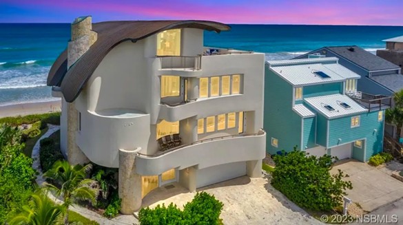 This four-story Florida beach house is a work of art, and it's on the market now