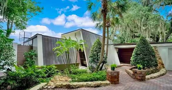 This Frank Lloyd Wright-inspired in Orlando hangs over Lake Rowena
