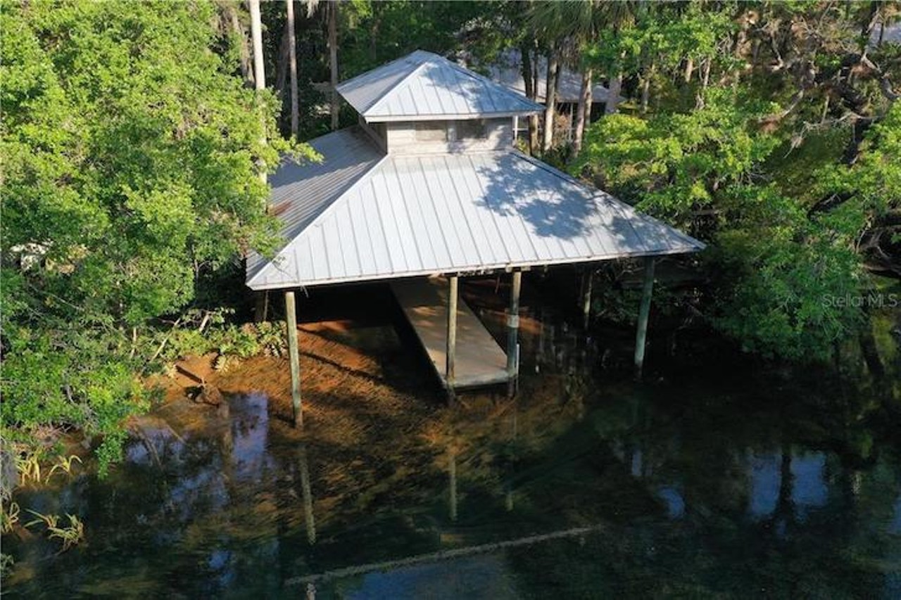 This property offers the rare opportunity to live directly on a Florida spring