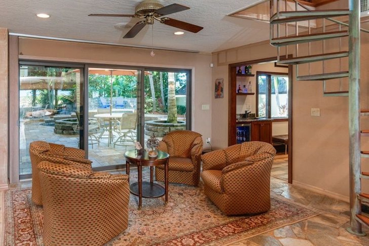 This seaside Cocoa Beach house for sale is perfect for hosting private tiki parties