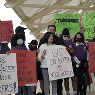 Orlando International Airport workers walk out on the cusp of MCO's busiest travel season