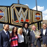 Mayor Buddy Dyer unveils giant WrestleMania title belt at Lake Eola