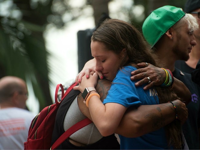 Pulse survivors honor 49 victims at Orlando rally demanding gun reform, LGBTQ rights