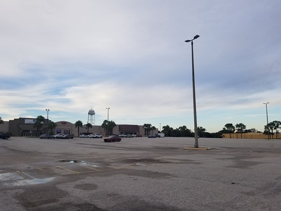 The front parking lot, visible from Hwy 441, sits mostly empty on a recent afternoon. Most of the cars seem to be part of a construction crew working on roof leaks above the mall's Belk.