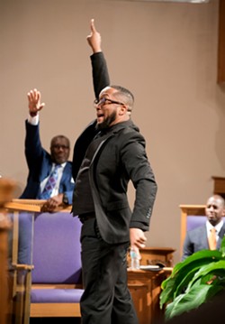 St. Mark AME Church Minister of Music Jeremiah Moore leads the choir. - Photo by Monivette Cordeiro