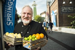 Chef Art Smith poses with fresh Florida produce to announce his farm-to-fork restaurant, Homecoming: Florida Kitchen and Southern Shine, opening summer 2016 at Disney Springs. - Photo via Walt Disney World