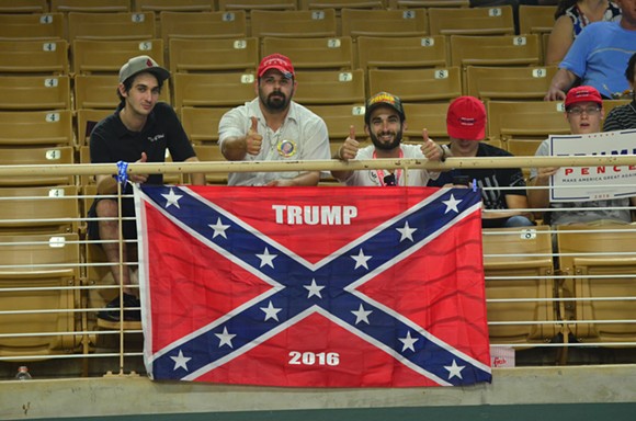 A 'Trump 2016' Confederate flag made its debut and exit at Thursday's Kissimmee rally