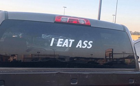 The actual "I Eat Ass" sticker - Photo via The Smoking Gun