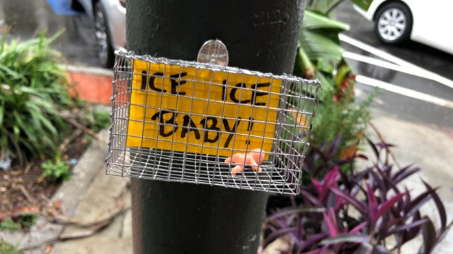 Florida artist cages toy babies to protest Trump's migrant detention centers (3)
