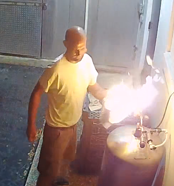 PHOTO FROM SURVEILLANCE VIDEO COURTESY OF ORLANDO FIRE DEPARTMENT PUBLIC INFORMATION OFFICE