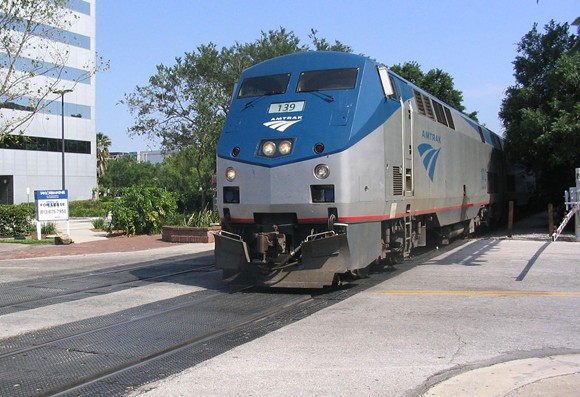 Southbound Amtrak on the Silver Star route, crossing Central Boulevard in downtown Orlando - Image by SPUI via Wikimedia Commons