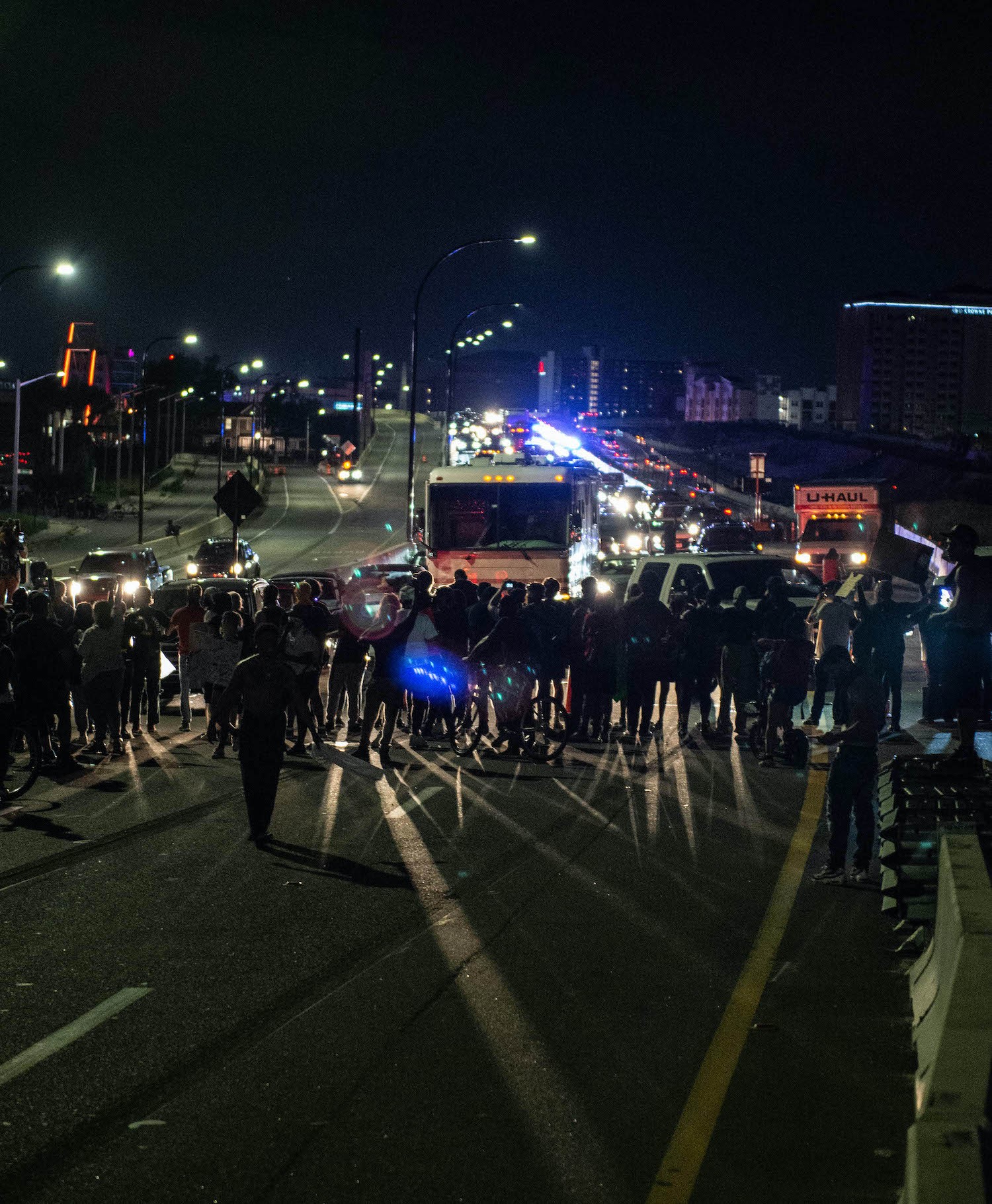 Police and protesters meet on the 408. (Photo by Nicolas Tamayo Leon) - Photo by Nicolas Tamayo Leon