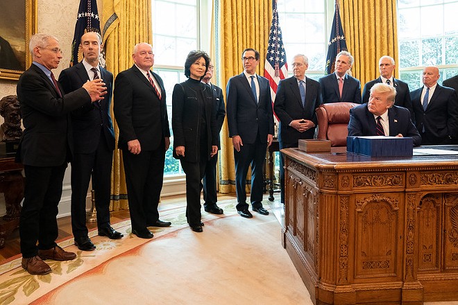 President Donald Trump signing the CARES Act in March - Official White House photo by Shealah Craighead