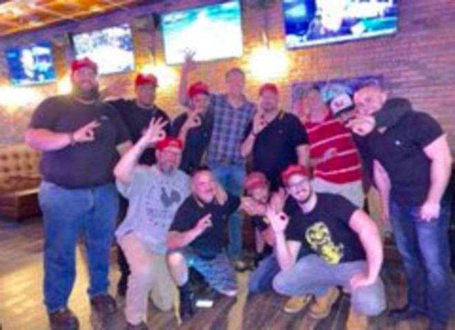 Nathanial Tuck, pictured on the far right of the photo in the black shirt, at the Proud Boy meet-up in Orlando. - PHOTO OBTAINED BY CREATIVE LOAFING TAMPA BAY