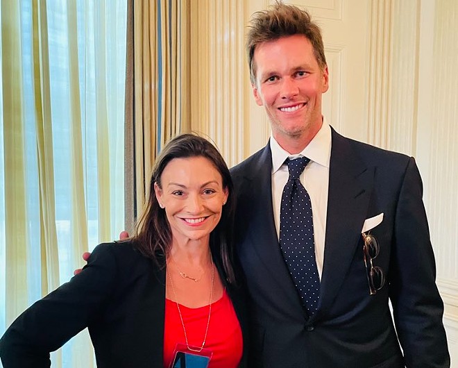 Florida's only statewide elected Democrat is facing criticism for posing with Tom Brady. - PHOTO VIA NIKKI FRIED/TWITTER