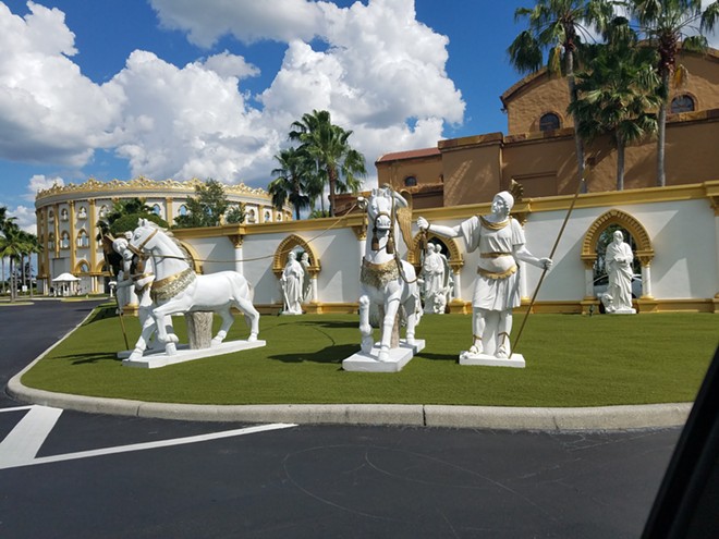 Jan Crouch era decorations at the Holy Land Experience with the Church of All Nations in the far left and the Scriptorium just across the wall on the right. - IMAGE VIA KEN STOREY