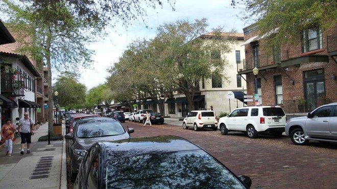 Hannibal Square in Winter Park offers multiple housing options with many streets, such as this section on New England Ave, featuring recent in-fill development that helps the area become more walkable. - Image via Ken Storey