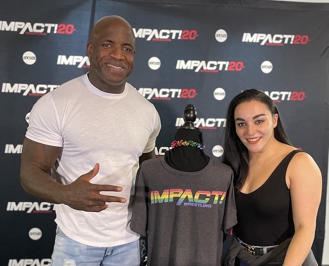 Moose and Deonna Purrazzo with the new Impact shirt - PHOTO BY MATTHEW MOYER