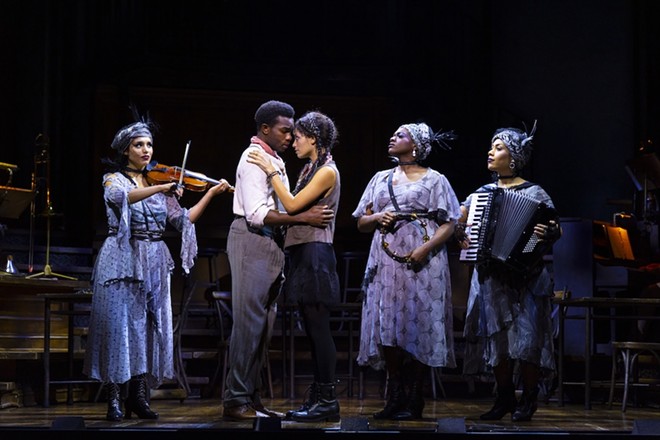 Center: Chibueze Ihuoma (Orpheus) and Hannah Whitley (Eurydice) in Hadestown - Photo by T. Charles Erickson