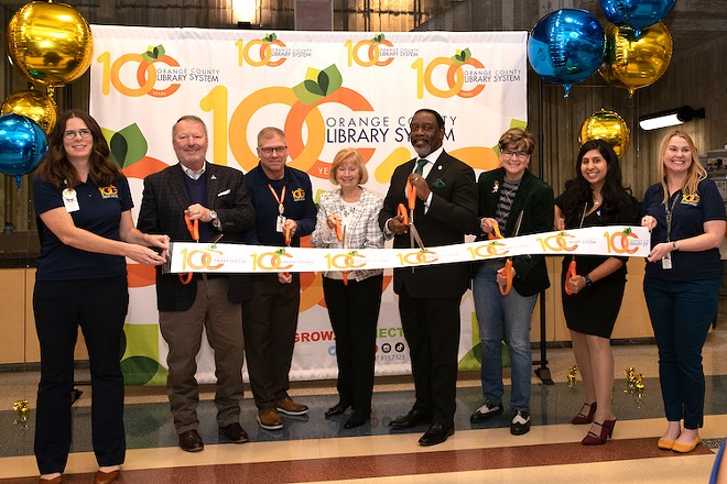 Local dignitaries cut the ribbon at OCLS' 110-year celebration - Photo courtesy Orange County Library System