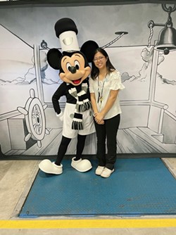 Patternmaker Cindy Hsu posing for a quick snap with Mickey Mouse. - Christine Martell
