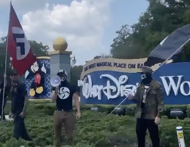 Nazi demonstrators wave DeSantis sign and swastikas outside Disney World in Orlando | Orlando Area News | Orlando