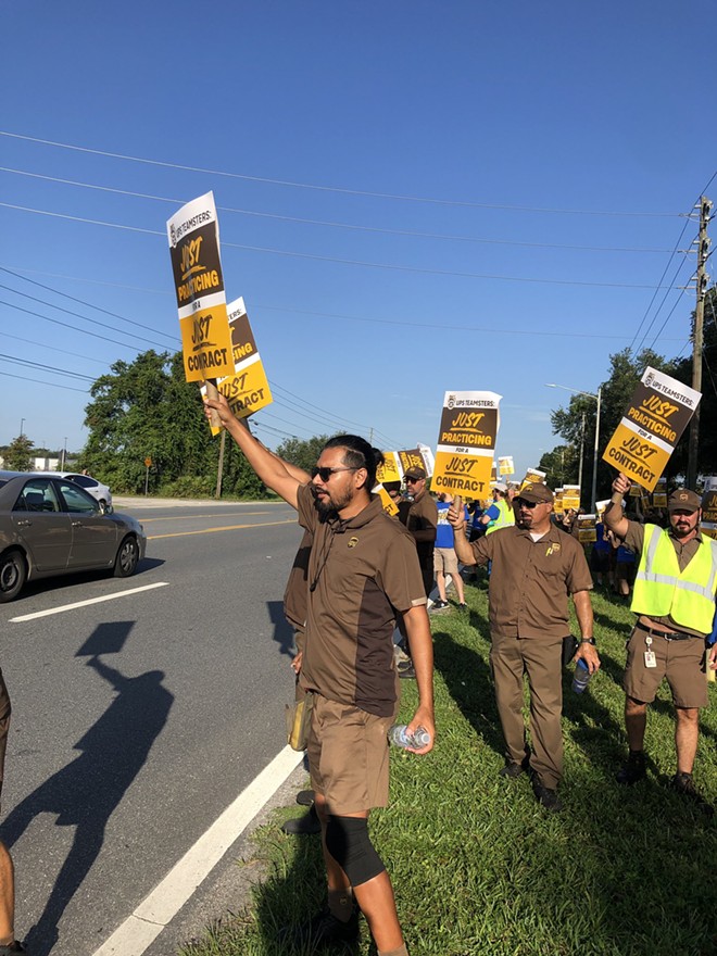 UPS Teamsters hold a practice picket outside of a UPC Customer Center in Orlando on July 13, 2023 ahead of a looming nationwide strike. - photo by McKenna Schueler