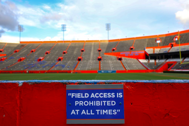 A no trespassing sign is posted along a wall surrounding Steve Spurrier-Florida Field at Ben Hill Griffin Stadium in Gainesville, Fla., Oct. 1, 2023. - Photo by Gabriel Velasquez Neira/WUFT News