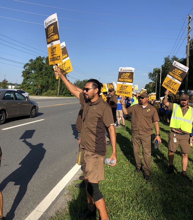 UPS Teamsters hold a practice picket outside of a UPC Customer Center in Orlando on July 13, 2023 ahead of a looming nationwide strike. - photo by McKenna Schueler