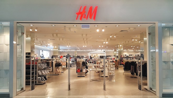 An H&M clothing store inside a mall. - Shutterstock