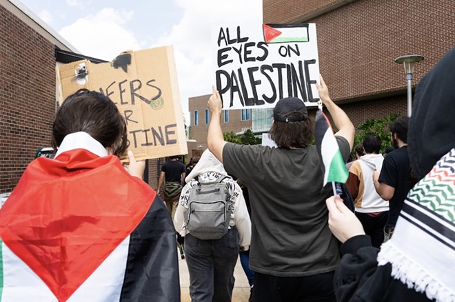 University of Central Florida students rally in protest of Israel's occupation of Gaza. - Photo by Mauricio Murillo