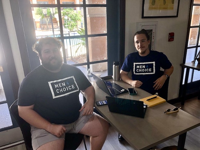 Florida men make calls for Florida's Amendment 4 as part of a joint effort by Mi Vecino and Men 4 Choice to get out the vote. - photo by McKenna Schueler