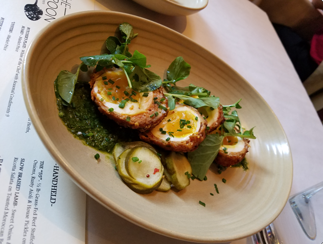 The Rusty Spoon's version of Scotch eggs, with Lake Meadows Naturals egg, chicken sausage, salsa verde and house-made spicy pickles. - Clifford Alejos