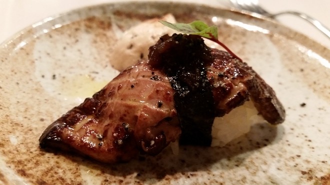 15. Nigiri of seared foie gras, shallot jam, faux unagi foam