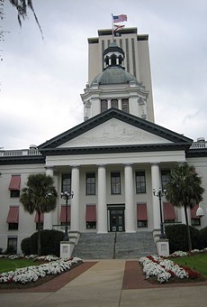 The old capitol building (foreground) and the new one (background)