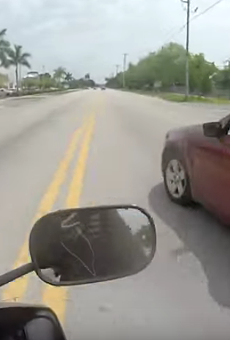 Video captures insanely dangerous Florida road rage battle between a car and a motorcycle