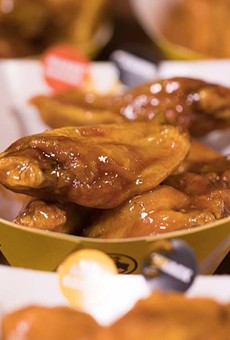 You can eat your Buffalo Wild Wings at select locations starting Friday